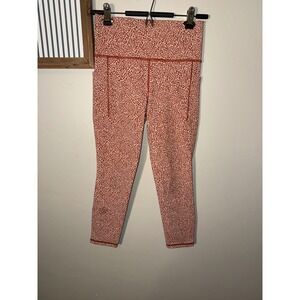 Athleta Salutation Stash Textured Tight Orange Leopard Print Leggings Small